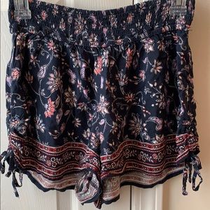 Navy floral high rise flowy shorts